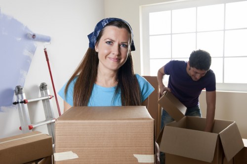 Packed boxes and household items loaded into a removal van