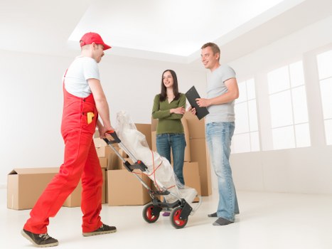 Team preparing an office move with packing and scheduling coordination