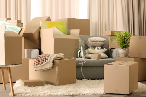 Loading boxes and furniture into a moving truck in Monument
