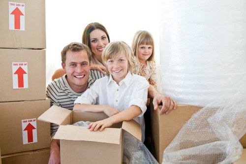 Careful furniture handling by house movers during a Monument relocation